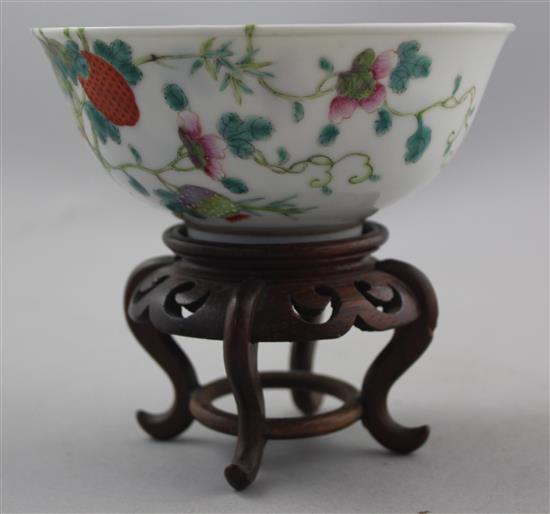 A Chinese famille rose lychees bowl, Guangxu mark and probably of the period (1875-1908), 13.5cm, wood stand